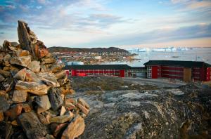 a pile of rocks sitting on top of a mountain at Hotel Arctic in Ilulissat