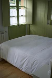 Katil atau katil-katil dalam bilik di Las Casinas de la Granda