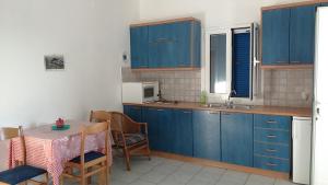 Кухня или мини-кухня в Studios Remvi
