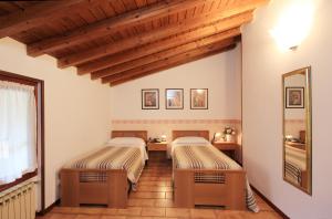 Postel nebo postele na pokoji v ubytování Hotel Colomber + 37 fotografií