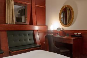 Postel nebo postele na pokoji v ubytování Hotel Senigallia