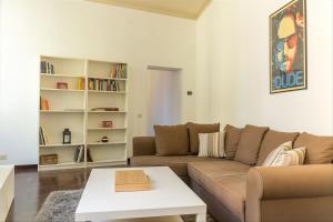 A seating area at Palazzo Borghese Lovely Flat
