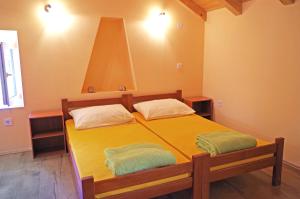 Postel nebo postele na pokoji v ubytování apartman željana