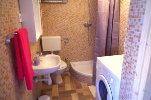 Koupelna v ubytování apartman željana + 10 fotografií