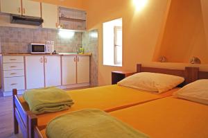 Postel nebo postele na pokoji v ubytování apartman željana