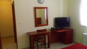 TV a/nebo společenská místnost v ubytování Apartments Vila Kristina