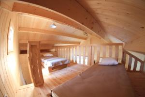 Postel nebo postele na pokoji v ubytování Cabanes et Lodges du Belvedere