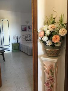 Postel nebo postele na pokoji v ubytování S'Istentale