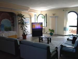 TV a/nebo společenská místnost v ubytování Residence Marina Palace