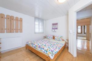 Łóżko lub łóżka w pokoju w obiekcie Landhaus Lindner Appartements