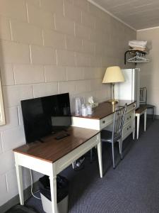TV o dispositivi per l'intrattenimento presso Manitou Motor Inn
