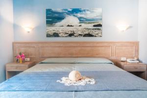 Postel nebo postele na pokoji v ubytování Hotel Marelba
