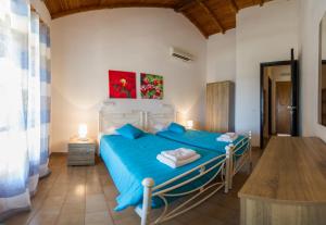 Posteľ alebo postele v izbe v ubytovaní Renata Rooms & Studios