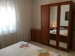 Posteľ alebo postele v izbe v ubytovaní Apartments Banic