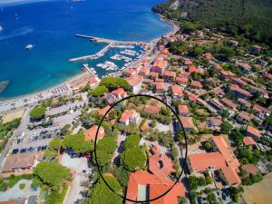 an aerial view of a resort next to the ocean at Hotel Marelba in Cavo