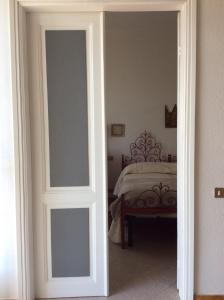 A bed or beds in a room at Aia dei Limoni