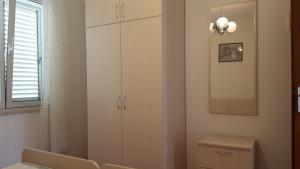 Koupelna v ubytování Apartments Kekica + 28 fotografií