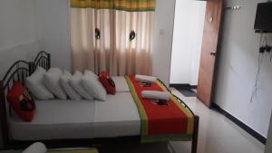 Letto o letti in una camera di Charlton Kandy City Rest
