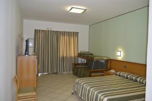 Postel nebo postele na pokoji v ubytování Hotel Zilema + 37 fotografií