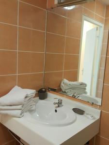 Koupelna v ubytování Hotel-appart Les Manguiers