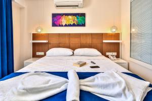 Postel nebo postele na pokoji v ubytování Kaş Artemis Hotel