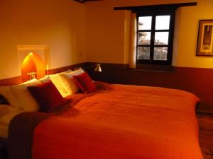 Postel nebo postele na pokoji v ubytování Milla Guesthouse Bhaktapur