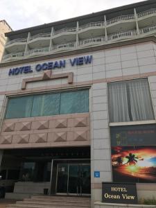 a hotel ocean view building with a sign on it at Hotel Ocean View in Ulsan