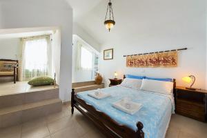 Postel nebo postele na pokoji v ubytování Beachfront Villa Rhodes SeaShell