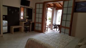TV a/nebo společenská místnost v ubytování B&B ENSILEVA BEACH