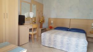 Postel nebo postele na pokoji v ubytování B&B ENSILEVA BEACH
