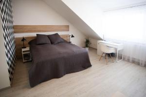 Posteľ alebo postele v izbe v ubytovaní Haas Apartments
