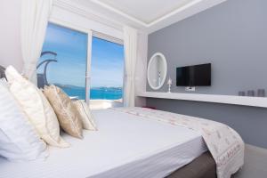 Posteľ alebo postele v izbe v ubytovaní Apartments Soho + 37 fotografií