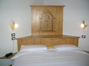 Postel nebo postele na pokoji v ubytování Hotel Villa Fosine