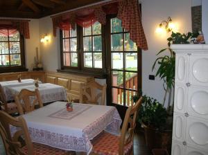 Postel nebo postele na pokoji v ubytování Hotel Villa Fosine