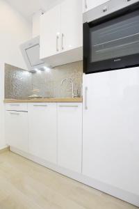 Kuchyň nebo kuchyňský kout v ubytování A'marie Apartments SELF CHECK-IN