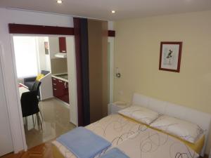 Postel nebo postele na pokoji v ubytování Guest House Mireja