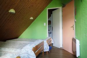 Voodi või voodid majutusasutuse Gîte Soum de l'Ase toas