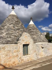 Foto sihtkohas Locorotondo asuva majutusasutuse Trulli di Pozzomasiello galeriist