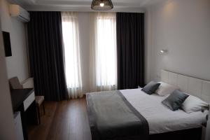Postel nebo postele na pokoji v ubytování Guest House Gantiadi