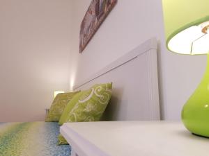 Postel nebo postele na pokoji v ubytování B&B Verdearancio