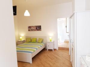 A bed or beds in a room at B&B Verdearancio