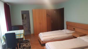 Postel nebo postele na pokoji v ubytování Hotel Mare & Monti