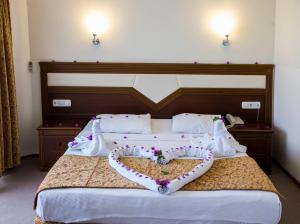 Postel nebo postele na pokoji v ubytování Valeri Beach Hotel