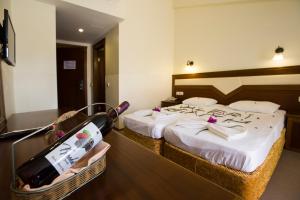 Postel nebo postele na pokoji v ubytování Valeri Beach Hotel