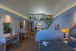 Postel nebo postele na pokoji v ubytování Anassa Deluxe Suites + 37 fotografií