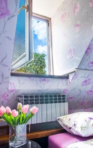 Postel nebo postele na pokoji v ubytování Hostel Centar