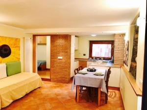 A bed or beds in a room at Appartamento Armonia
