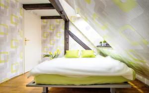 Postel nebo postele na pokoji v ubytování Hostel Centar