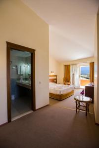 Postel nebo postele na pokoji v ubytování Valeri Beach Hotel