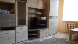 Телевизор и/или развлекательный центр в Šiauliai Centre Apartment